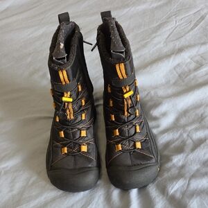 Black Winter Boots with Yellow Accents